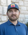 Manager Matthew Ely